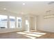 Sunlit dining room featuring hardwood floors and a chandelier at 10509 Boudreaux St, Huntersville, NC 28078
