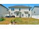 Spacious backyard with patio, grill, and home view at 11407 Sidney Crest Ave, Charlotte, NC 28213