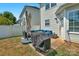 Cozy patio with seating, umbrella, and grill at 11407 Sidney Crest Ave, Charlotte, NC 28213