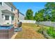 Fenced backyard with patio, grill, and open space at 11407 Sidney Crest Ave, Charlotte, NC 28213