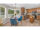 Kitchen with breakfast nook and modern appliances at 11407 Sidney Crest Ave, Charlotte, NC 28213