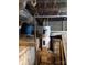 Unfinished basement with water heater and pipes at 2222 19Th Ne Ave, Hickory, NC 28601