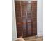 Wood louvered three-door closet in bedroom at 2222 19Th Ne Ave, Hickory, NC 28601