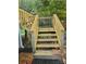 Wooden deck stairs leading to yard at 2222 19Th Ne Ave, Hickory, NC 28601
