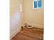 Laundry room with vinyl flooring and a window at 2222 19Th Ne Ave, Hickory, NC 28601