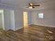 Bright living room with hardwood floors and ceiling fan at 2222 19Th Ne Ave, Hickory, NC 28601
