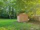 Tan colored storage shed in backyard at 2222 19Th Ne Ave, Hickory, NC 28601