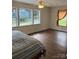 Sunlit bedroom featuring sleek flooring and ample windows, creating a bright and inviting atmosphere at 3329 Draper Ave, Charlotte, NC 28205