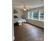 Bright bedroom featuring wood floors and large windows that offer plenty of natural light at 3329 Draper Ave, Charlotte, NC 28205