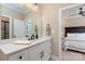 Clean bathroom with white vanity and a view into bedroom at 859 Irish Creek Dr, Landis, NC 28088