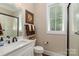 Clean bathroom with white vanity, walk-in shower, and neutral color palette at 859 Irish Creek Dr, Landis, NC 28088