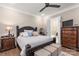 Spacious bedroom with dark wood furniture and soft bedding at 859 Irish Creek Dr, Landis, NC 28088