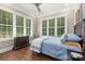 Comfortable bedroom with large windows, ceiling fan, and ample natural light at 859 Irish Creek Dr, Landis, NC 28088