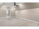 Bright and airy bonus room with neutral carpeting and lots of natural light at 859 Irish Creek Dr, Landis, NC 28088