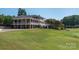 Two-story clubhouse with golf course views at 859 Irish Creek Dr, Landis, NC 28088