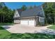 Three-car garage with ample parking space at 859 Irish Creek Dr, Landis, NC 28088