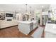 Spacious kitchen boasts an island, stainless steel appliances, and white cabinetry at 859 Irish Creek Dr, Landis, NC 28088