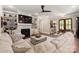 Open concept living room with built-in shelves and fireplace at 859 Irish Creek Dr, Landis, NC 28088
