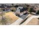 Aerial view of a residential property with a large driveway, spacious backyard and mature landscaping at 191 Melbourne Dr, Fort Mill, SC 29708