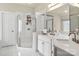 Bright bathroom with double vanity, large mirror, and glass-enclosed shower at 191 Melbourne Dr, Fort Mill, SC 29708