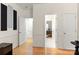 Light and airy bedroom with wood floors and an open doorway at 191 Melbourne Dr, Fort Mill, SC 29708