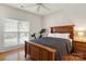 Bedroom with hardwood floors, ceiling fan, and natural light from the window at 191 Melbourne Dr, Fort Mill, SC 29708