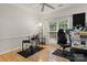 Bedroom with hardwood floors, ceiling fan, and view of trees at 191 Melbourne Dr, Fort Mill, SC 29708