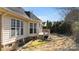 Exterior view of a house with a deck and grassy backyard on a sunny day at 191 Melbourne Dr, Fort Mill, SC 29708