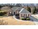 Well-maintained brick home showcasing beautiful landscaping and a classic architectural design at 191 Melbourne Dr, Fort Mill, SC 29708