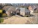 Attractive single-Gathering home with a well-manicured front lawn and traditional brick facade at 191 Melbourne Dr, Fort Mill, SC 29708