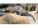 Charming brick home with well-kept lawn, mature trees, and an inviting driveway at 191 Melbourne Dr, Fort Mill, SC 29708