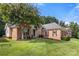 Attractive brick home presents a meticulously landscaped front yard and inviting entrance at 191 Melbourne Dr, Fort Mill, SC 29708
