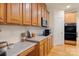 This kitchen has wooden cabinets, stainless steel microwave, and oven appliances at 191 Melbourne Dr, Fort Mill, SC 29708