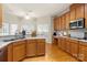 Spacious kitchen with stainless steel appliances, granite countertops, and a ceiling fan at 191 Melbourne Dr, Fort Mill, SC 29708