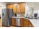The kitchen has stainless steel appliances including a refrigerator and dishwasher at 191 Melbourne Dr, Fort Mill, SC 29708
