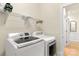 Well-equipped laundry room featuring modern washer and dryer units at 191 Melbourne Dr, Fort Mill, SC 29708