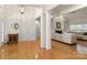 Open-concept living room featuring hardwood floors and neutral decor at 191 Melbourne Dr, Fort Mill, SC 29708
