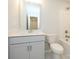 Clean bathroom with single vanity, bathtub, and neutral tones at 10513 Boudreaux St, Huntersville, NC 28078