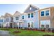 Charming townhouses with landscaped yards and neutral colors at 10513 Boudreaux St, Huntersville, NC 28078