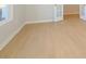 Light hardwood floors in corner of room, near door and window at 10513 Boudreaux St, Huntersville, NC 28078