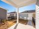 Private patio with access to backyard and adjacent garage at 10513 Boudreaux St, Huntersville, NC 28078