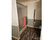 Clean bathroom with a shower/tub combo and updated flooring at 735 Ned Marsh Rd, Salisbury, NC 28146