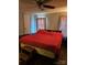 Bedroom with king-size bed and red bedding at 735 Ned Marsh Rd, Salisbury, NC 28146