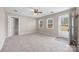 Open bedroom featuring neutral walls, carpet flooring, and direct access to the outdoors at 101 Turner Dr, Clover, SC 29710