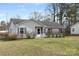 View of the front of the home and yard, showing curb appeal and a well-kept lawn at 101 Turner Dr, Clover, SC 29710