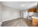 Open kitchen area featuring a refrigerator, an oven, and wood-look vinyl flooring at 101 Turner Dr, Clover, SC 29710