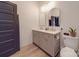 Stylish bathroom with double vanity, arched mirrors, and neutral tones at 818 N Jackson St, Salisbury, NC 28144