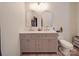 Elegant bathroom with double vanity and arched mirrors at 818 N Jackson St, Salisbury, NC 28144