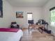 Bedroom with hardwood floors and a workspace at 818 N Jackson St, Salisbury, NC 28144