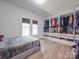 Bright bedroom with large closet and light wood floors at 818 N Jackson St, Salisbury, NC 28144